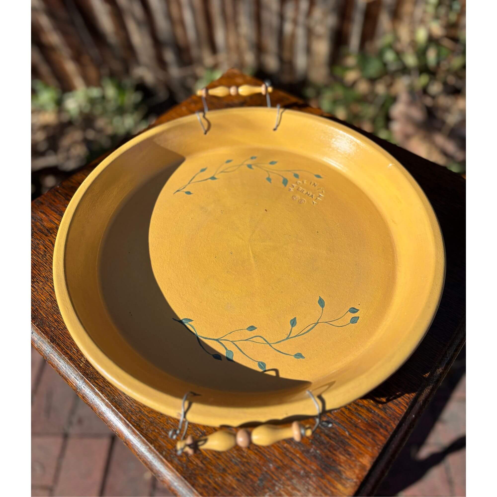Hand-painted mustard yellow terracotta platter made in Italy