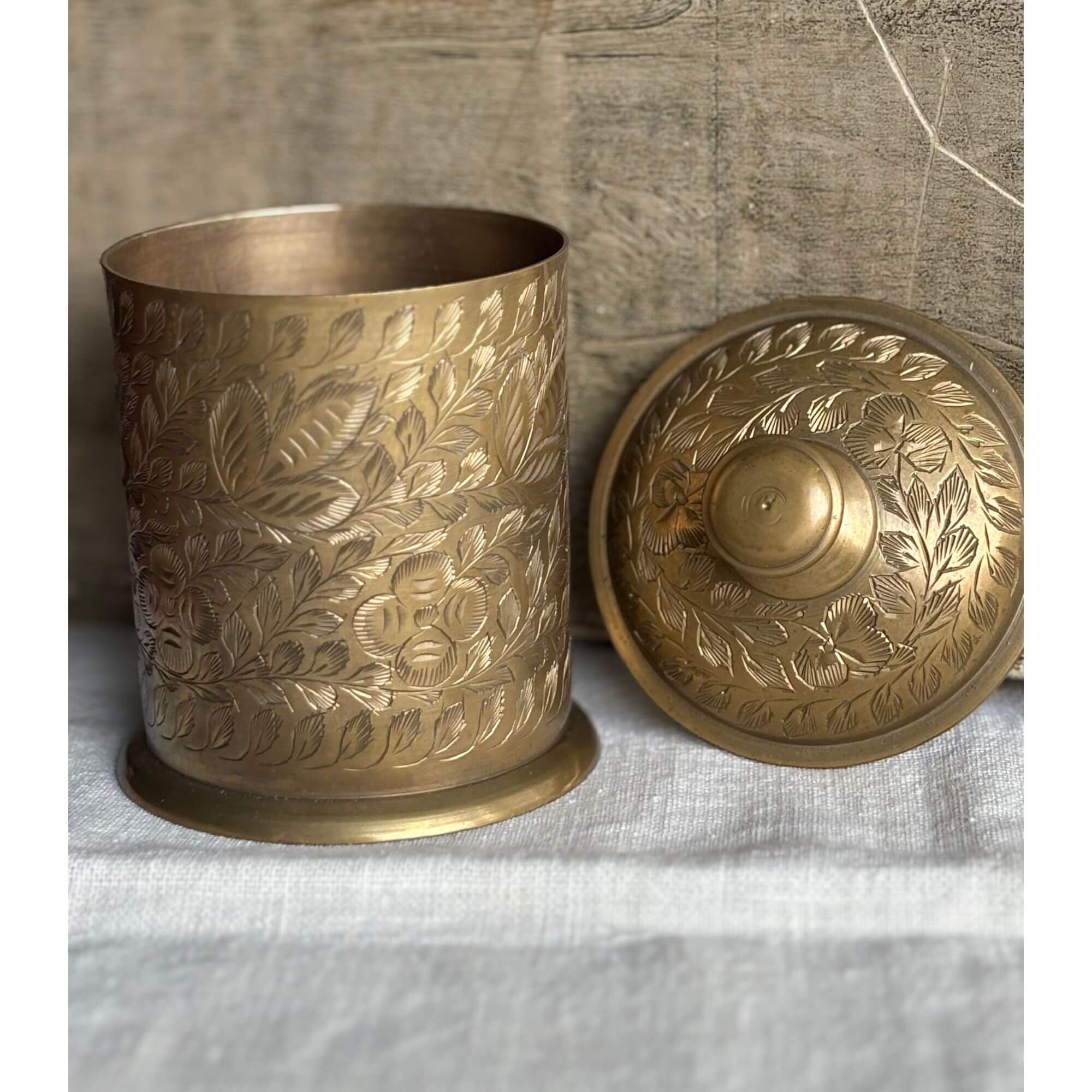 etched brass jar