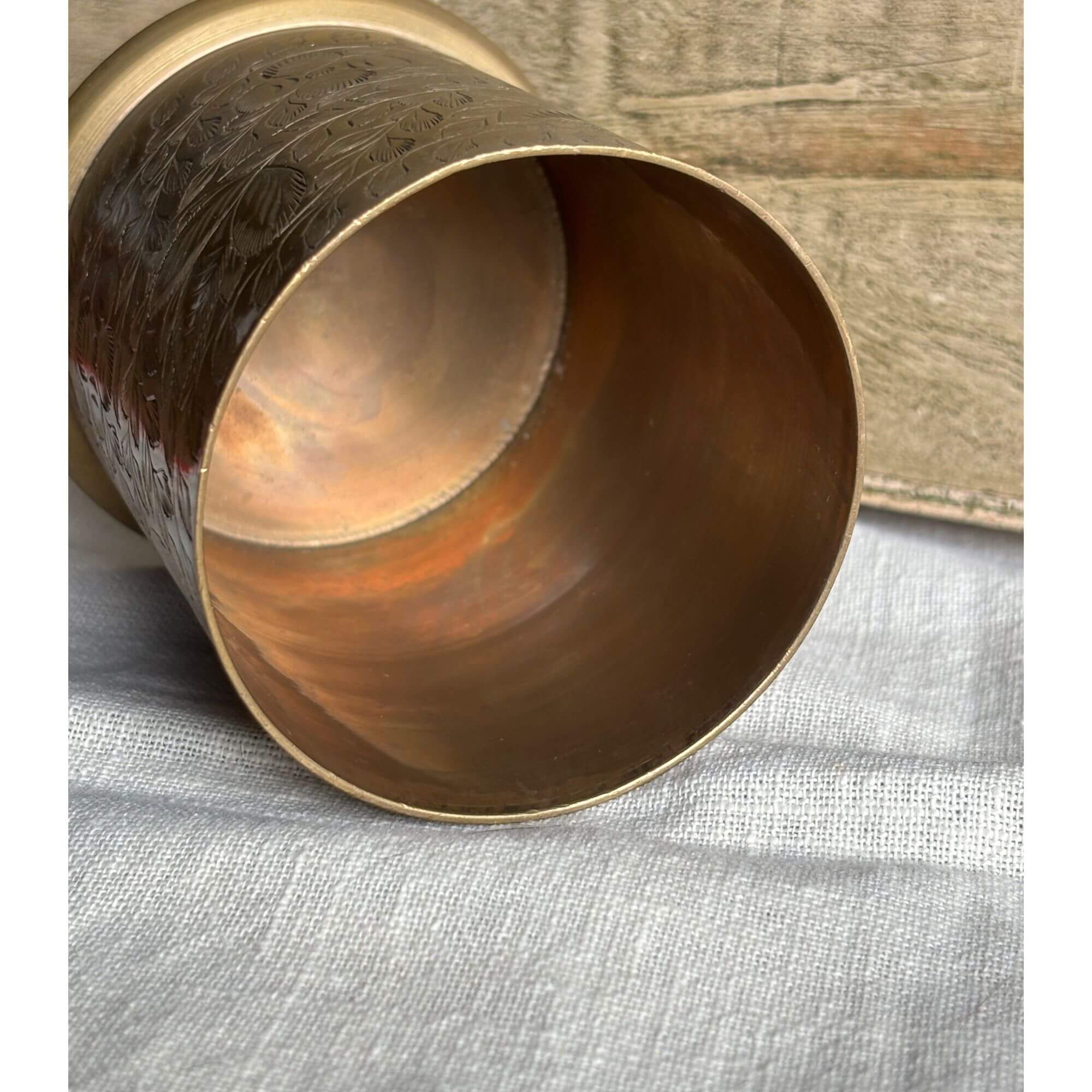 etched brass jar