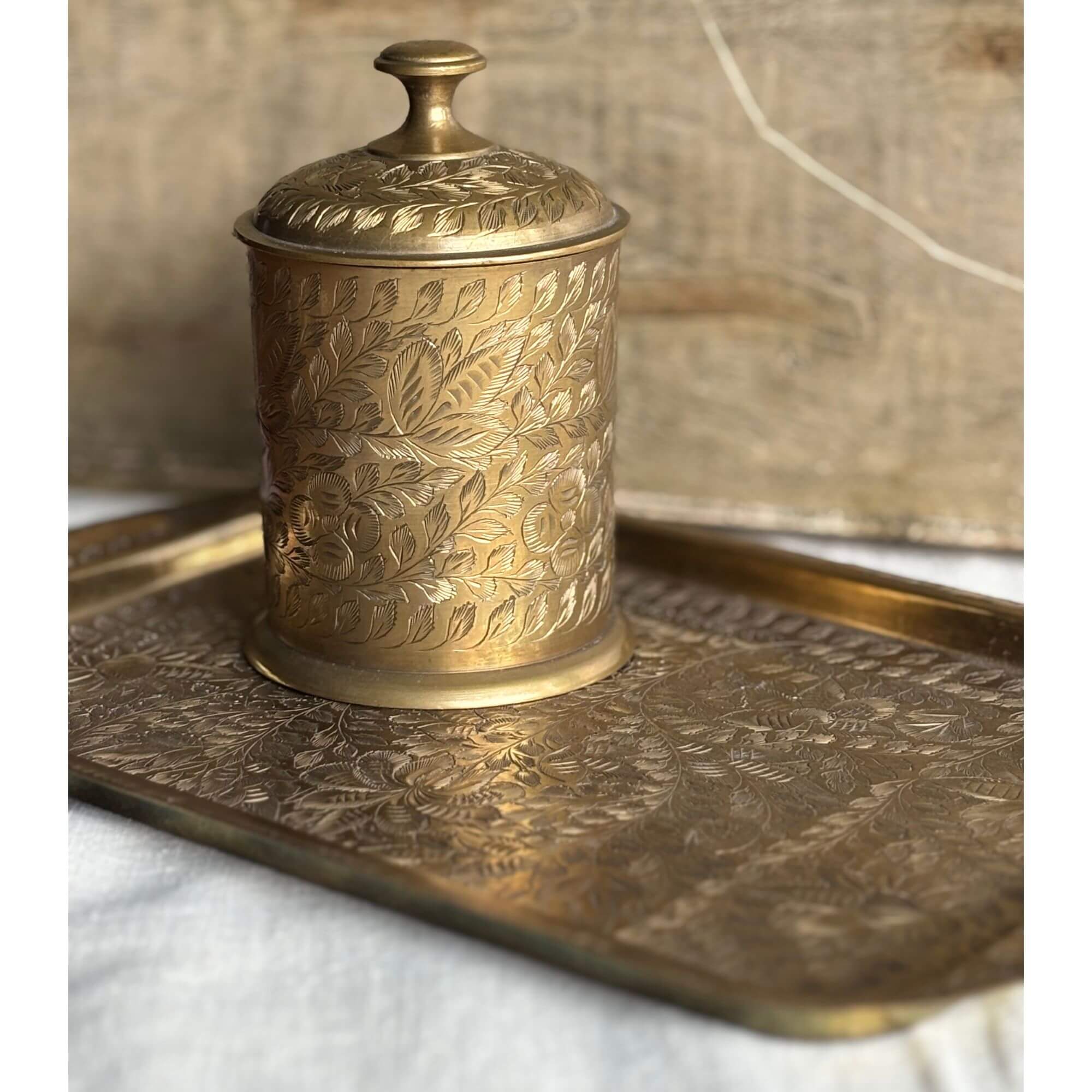 etched brass jar